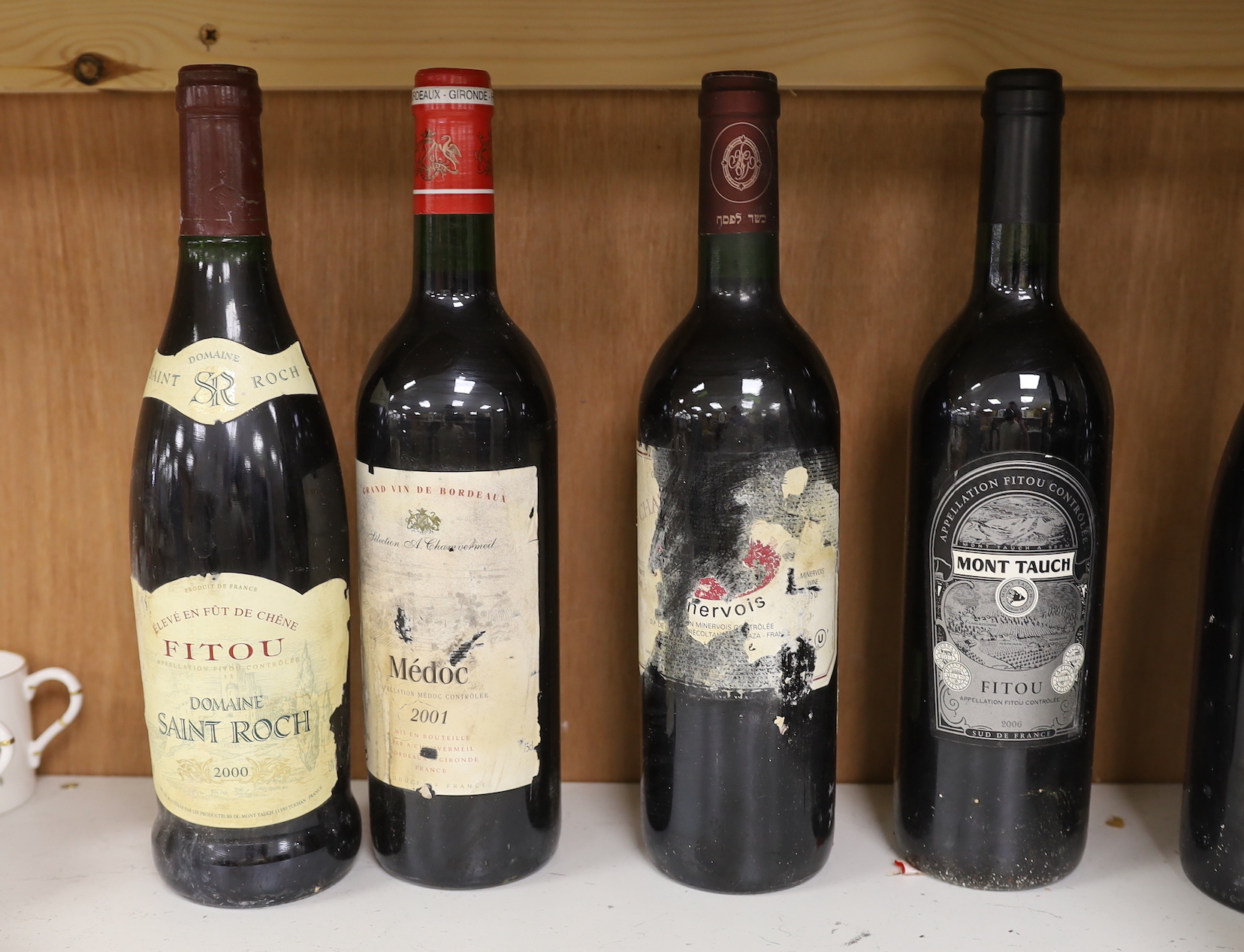 Twelve bottles of various wine